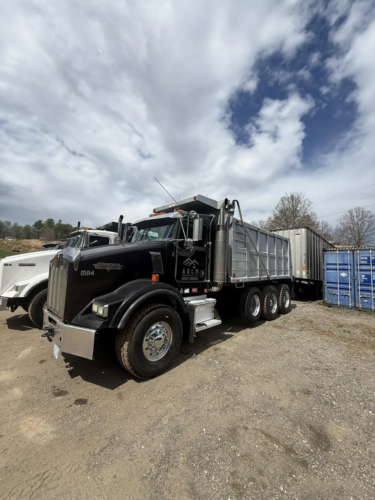 Tandem-axle dump truck used for hauling on AGLM site-work jobs